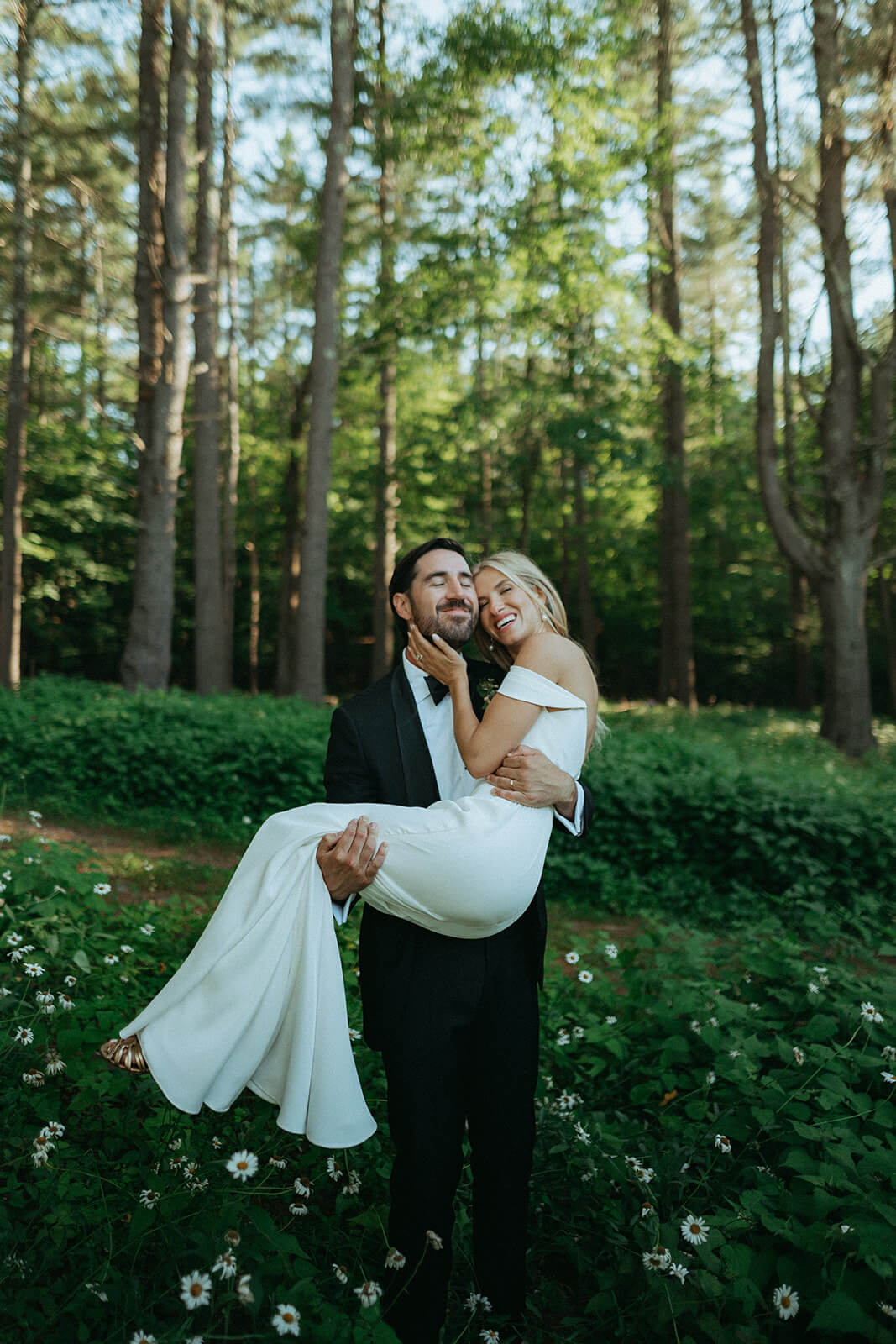 Groom holding bride during their New York Wedding