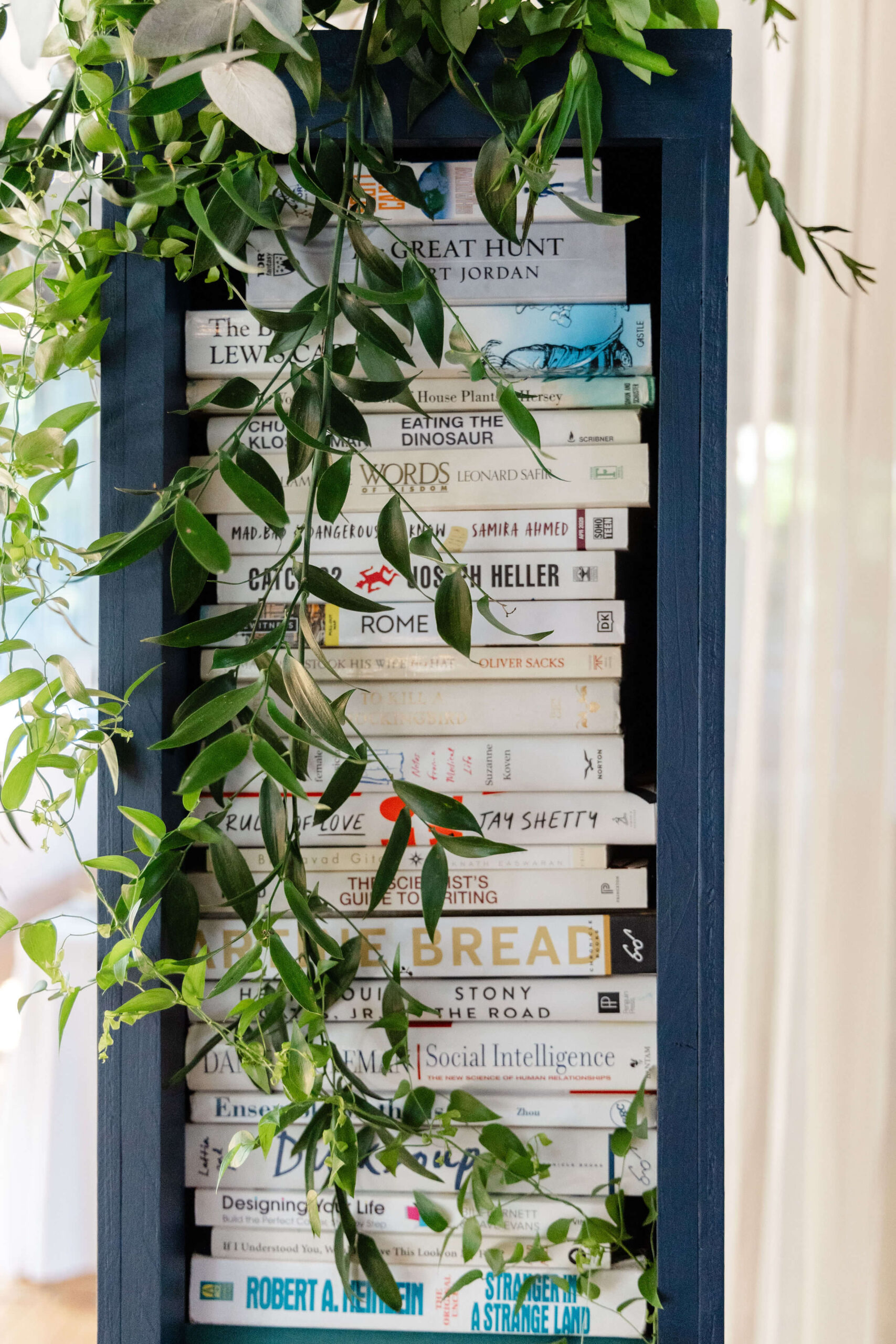 The bride and groom brought in books as decor for their Connecticut wedding.